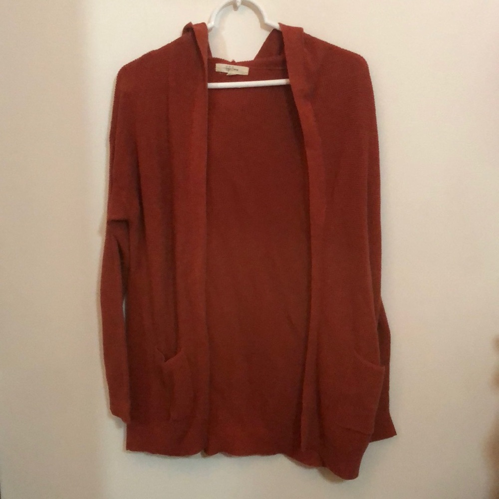 Rust colored cardigan size medium.